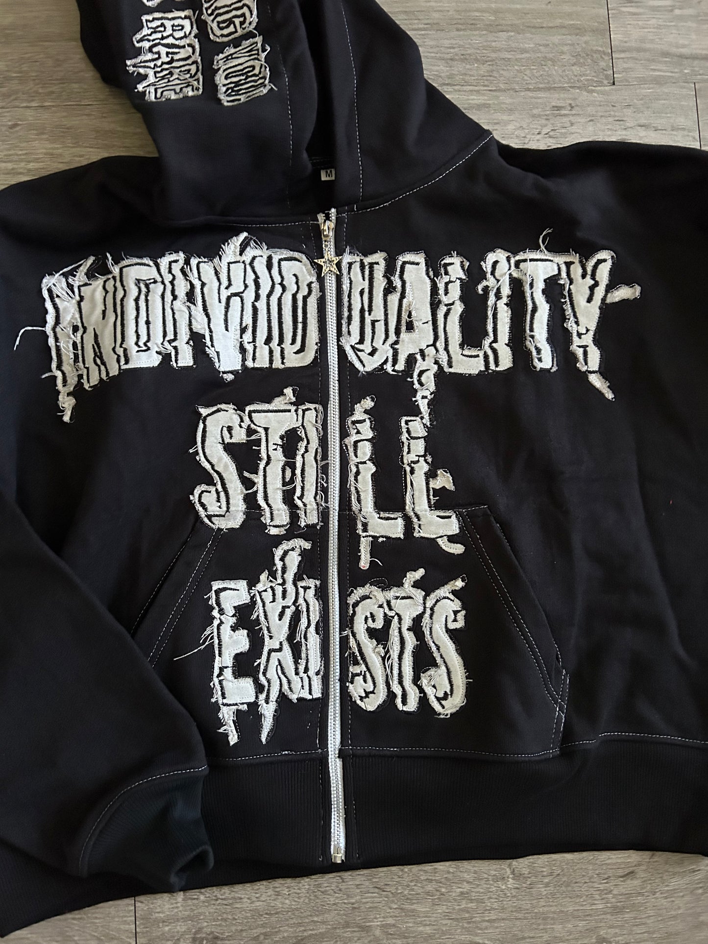 “Individuality Still Exists” Zip-Up